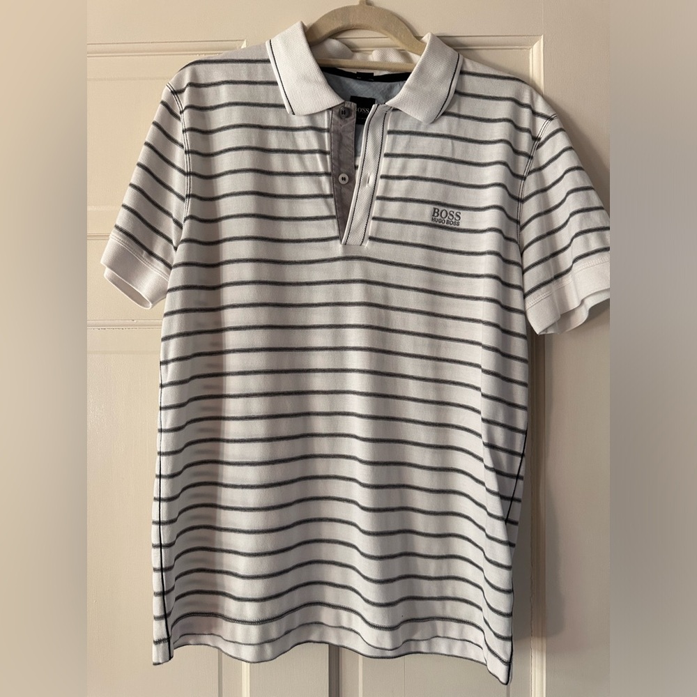 Never worn Hugo boss polo, striped, white and gray.